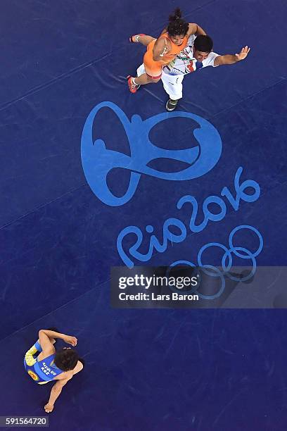 Sakshi Malik of India celebrates after defeating Aisuluu Tynybekova of Kyrgyzstan during the Women's Freestyle 58 kg Bronze match on Day 12 of the...