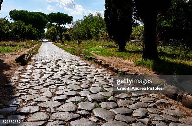 ancient via appia, roman road in rome - ancient rome stock-fotos und bilder