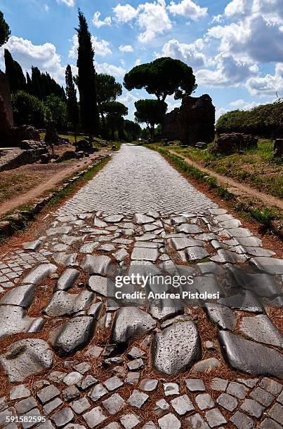 ancient via appia, roman road in rome - appian way stock pictures, royalty-free photos & images