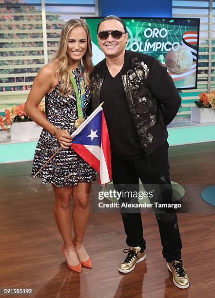 Rio Olympics 2016 Women's Singles Tennis Gold medalist Monica Puig of Puerto Rico and Elvis Crespo are seen on the set of "Un Nuevo Dia" at Telemundo...