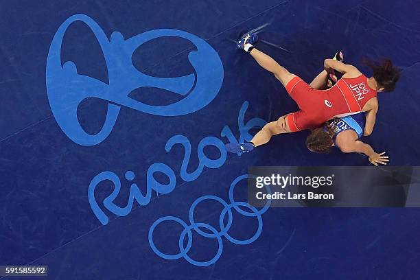 Valeriia Koblova Zholobova of Russia competes against Kaori Icho of Japan during the Women's Freestyle 58 kg Gold Medal match on Day 12 of the Rio...