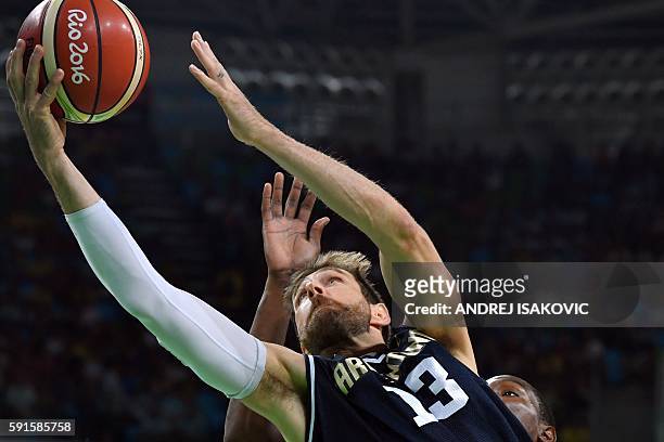 Argentina's small forward Andres Nocioni goes to the basket during a Men's quarterfinal basketball match between USA and Argentina at the Carioca...