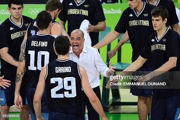 Argentina's head coach Sergio Hernandez shouts at Argentina's shooting guard Patricio Garino during a Men's quarterfinal basketball match between USA...