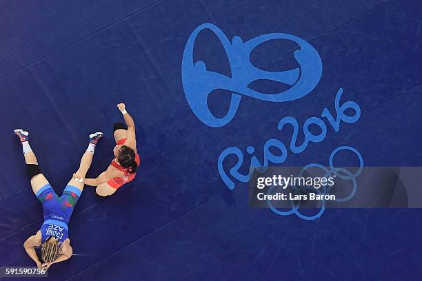 Eri Tosaka of Japan celebrates winning gold against Mariya Stadnik of Azerbaijan in the Women's Freestyle 48kg event on Day 12 of the Rio 2016...