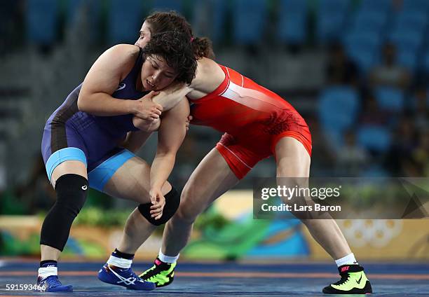 Natalia Vorobeva of Russia competes against Sara Dosho of Japan during the Women's Freestyle 69kg Gold Medal bout on Day 12 of the Rio 2016 Olympic...