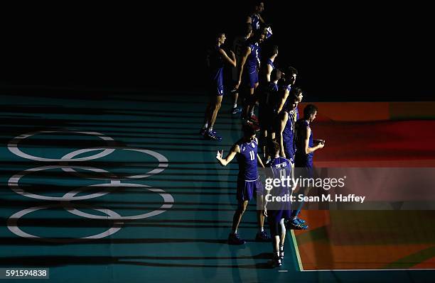 Team Italy enters the court prior to Team Iran during the Men's Quarterfinal Volleyball match on Day 12 of the Rio 2016 Olympic Games at...