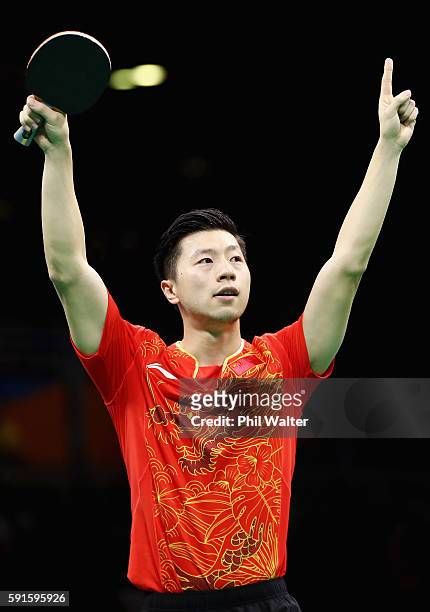 Long Ma of China celebrates during the Men's Table Tennis gold medal match against Koki Niwa of Japan at Riocentro - Pavilion 3 on Day 12 of the Rio...