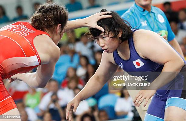 Japan's Sara Dosho wrestles with Russia's Natalia Vorobeva in their women's 69kg freestyle final match on August 17 during the wrestling event of the...