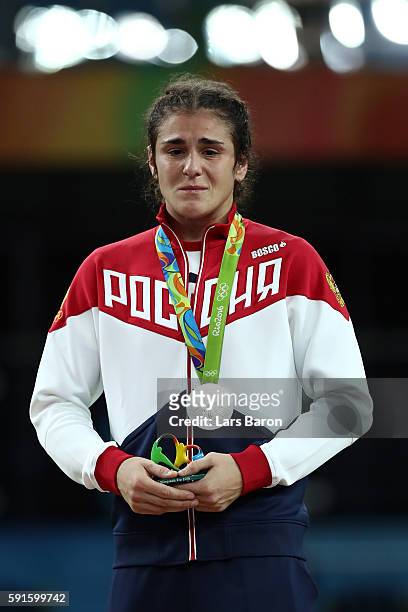 Silver medalist Natalia Vorobeva of Russia stands on the podium during the medal ceremony for the Women's Freestyle 69kg event on Day 12 of the Rio...