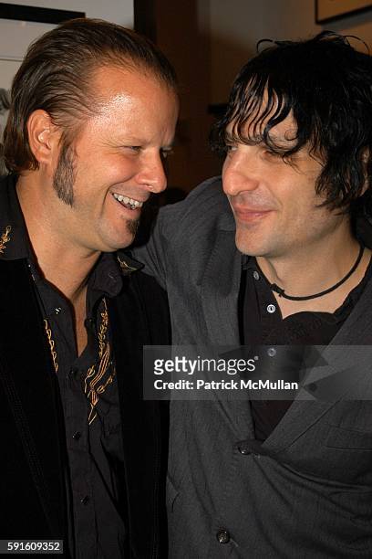 Danny Clinch and Jesse Malin attend John Varvatos Store Opening featuring the Photography of Danny Clinch at John Varvatos on November 14, 2005 in...