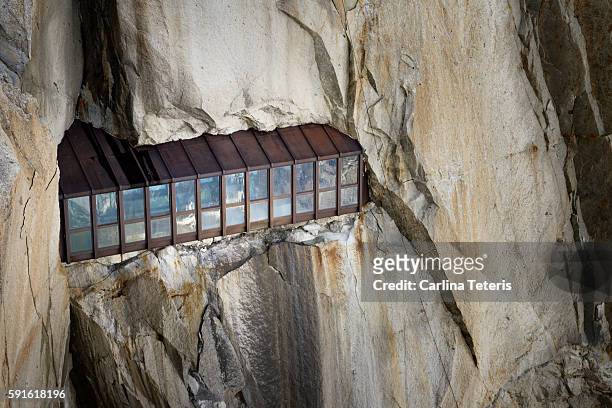 mountain side view point built into a stone cliff - aiguille du midi stock pictures, royalty-free photos & images