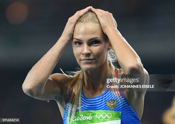 Russia's Darya Klishina reacts after a jump during the Women's Long Jump Final of the athletics event at the Rio 2016 Olympic Games at the Olympic...