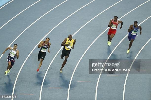 Britain's Adam Gemili, Canada's Andre De Grasse, Jamaica's Usain Bolt, Bahrain's Yaqoob Salem Eid Yaqoob and USA's Ameer Webb compete in the Men's...