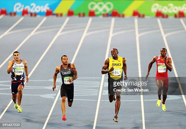 Adam Gemili of Great Britain, Andre de Grasse of Canada, Usain Bolt of Jamaica and Salem Eid Yaqoob of Bahrain compete in the Men's 200m Semifinals...