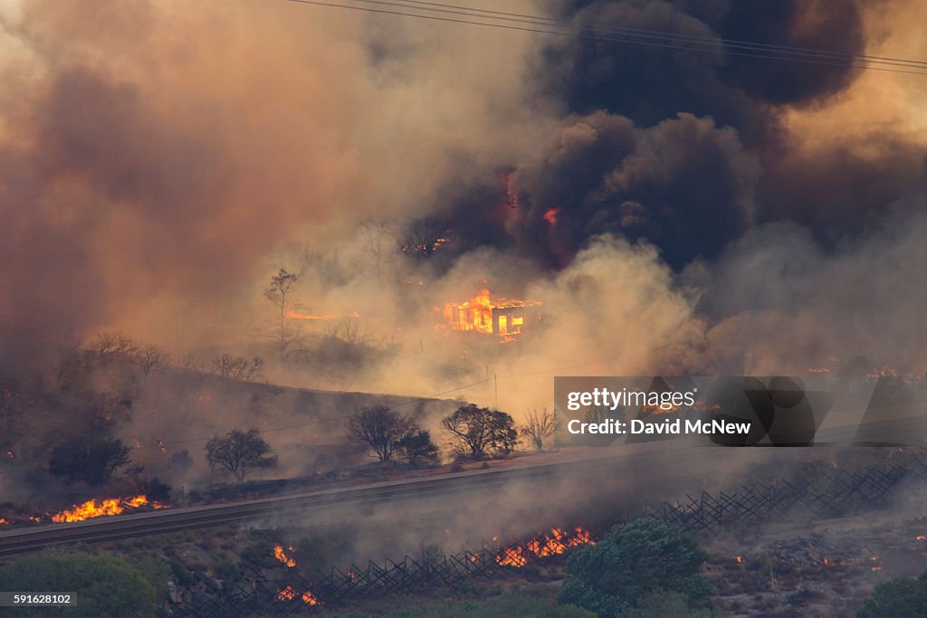 Blue Cut Fire Rages Through 30,000 Acres In Southern California