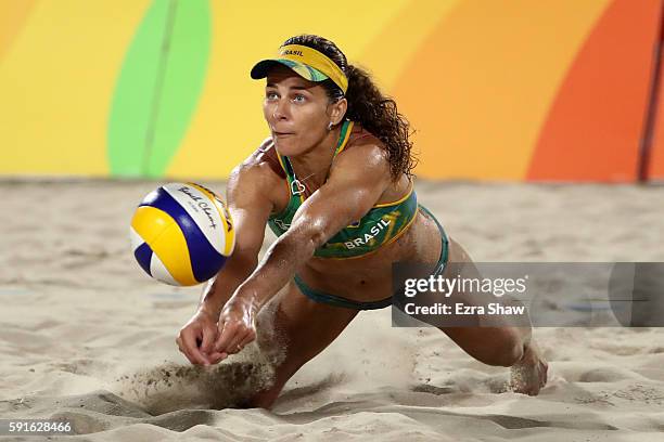 Larissa Franca Maestrini of Brazil plays a shot during the Beach Volleyball Women's Bronze medal match against Kerri Walsh Jennings of the United...