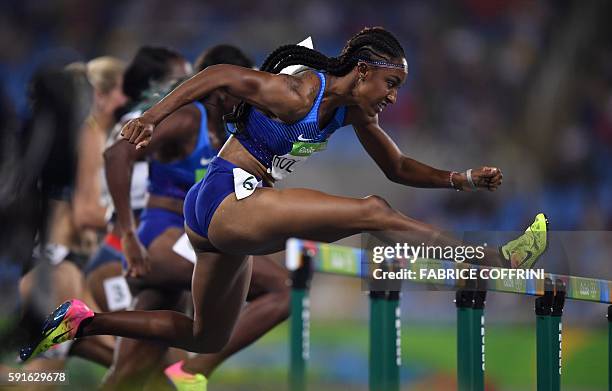 S Brianna Rollins competes in the Women's 100m Hurdles Final during the athletics event at the Rio 2016 Olympic Games at the Olympic Stadium in Rio...