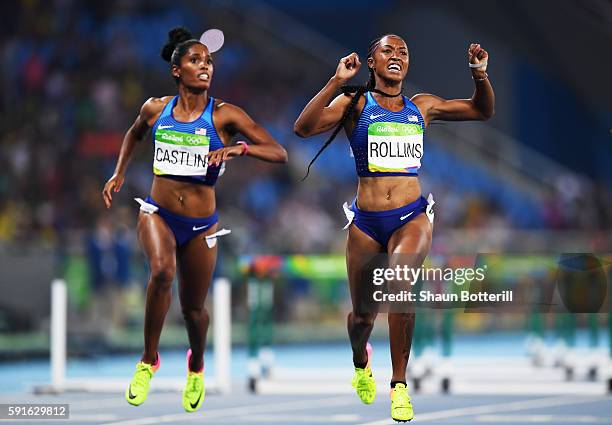 Bronze medalist Kristi Castlin of the United States and gold medalist Brianna Rollins of the United States celebrate as they finish the Women's 100m...