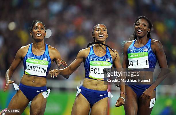 Bronze medalist Kristi Castlin, gold medalist Brianna Rollins and silver medalist Nia Ali of the United States react after the Women's 100m Hurdles...