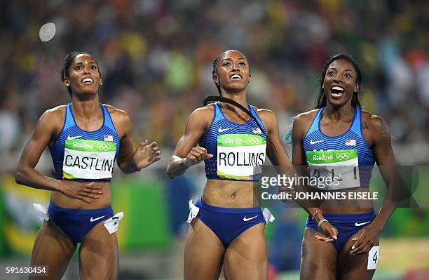 S Kristi Castlin, USA's Brianna Rollins and USA's Nia Ali celebrate after finishing respectively third first and second in the Women's 100m Hurdles...