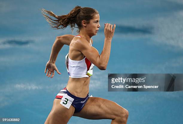Amalie Iuel of Norway competes during the Women's 400m Hurdles Round 1 on Day 10 of the Rio 2016 Olympic Games at the Olympic Stadium on August 15,...