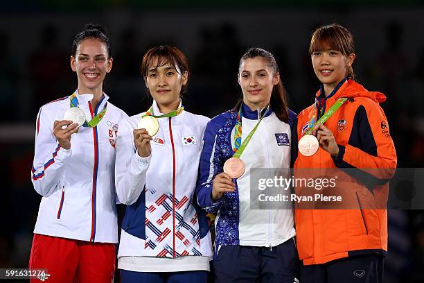 Silver medalist Tijana Bogdanovic of Serbia, gold medalist Sohui Kim of Korea, bronze medalist Patimat Abakarova of Azerbaijan and bronze medalist...
