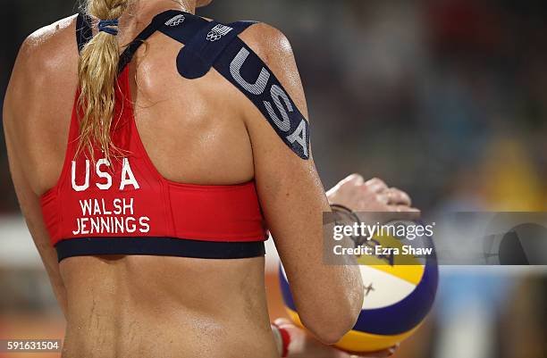 Kerri Walsh Jennings of the United States prepares to serve the ball during the Beach Volleyball Women's Bronze medal match against Larissa Franca...