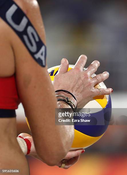 Kerri Walsh Jennings of the United States prepares to serve the ball during the Beach Volleyball Women's Bronze medal match against Larissa Franca...
