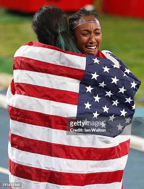 Silver medalist Nia Ali and gold medalist Brianna Rollins of the United States celebrate after the Women's 100m Hurdles Final on Day 12 of the Rio...