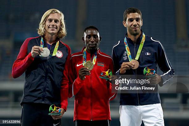Silver medalist Evan Jager of the United States, gold medalist Conseslus Kipruto of Kenya and bronze medalist Mahiedine Mekhissi of France pose on...
