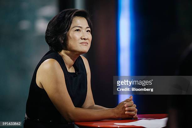 Billionaire Zhang Xin, chief executive officer of Soho China Ltd., sits during a Bloomberg Television interview in Hong Kong, China, on Thursday,...