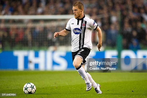 Daryl Horgan of Dundalk runs with the ball the UEFA Champions League Play-Offs 1st leg between Dundalk FC and Legia Warsaw at Aviva Stadium in...