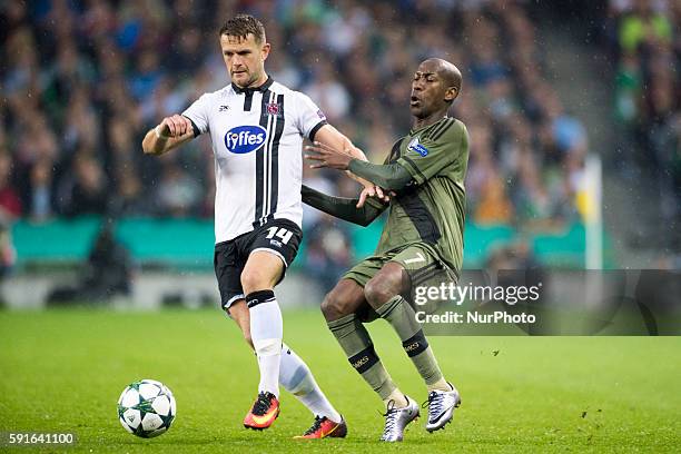 Dane Massey of Dundalk duels with Steeven Langil of Legia during the UEFA Champions League Play-Offs 1st leg between Dundalk FC and Legia Warsaw at...