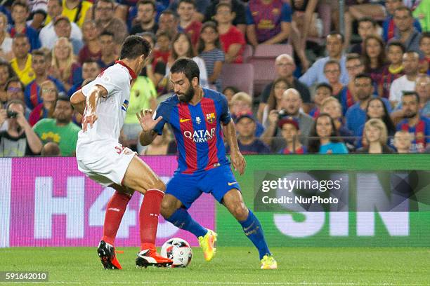 Barcelona's Arda Turan in action during the second-leg of the Spanish Super Cup football match between FC Barcelona and Sevilla FC at Camp Nou...