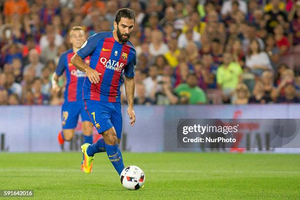 Barcelona's Arda Turan in action during he second-leg of the Spanish Super Cup football match between FC Barcelona and Sevilla FC at Camp Nou Stadium...