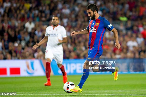 Barcelona's Arda Turan in action during he second-leg of the Spanish Super Cup football match between FC Barcelona and Sevilla FC at Camp Nou Stadium...