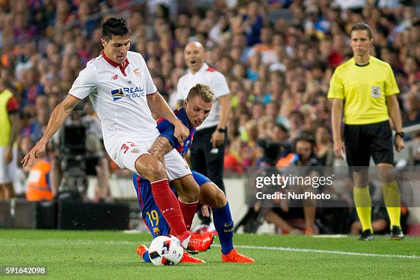 Barcelona's Digne in action during the second-leg of the Spanish Super Cup football match between FC Barcelona and Sevilla FC at Camp Nou Stadium on...