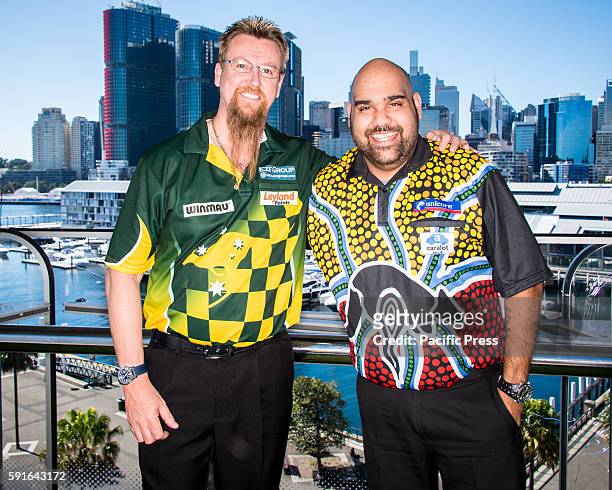 Australian professional darts player Simon Whitlock and Indigenous player Kyle Anderson pose during a press conference ahead of the Sydney round of...