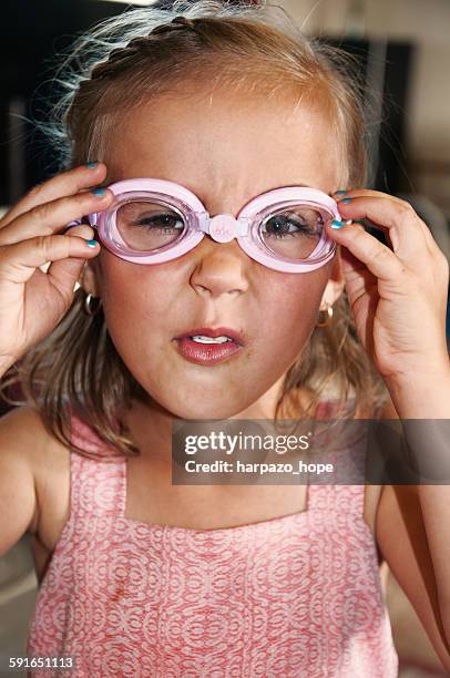 goofy girl with swimming goggles - simglasögon bildbanksfoton och bilder