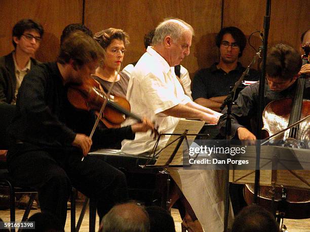 Israeli pianist Daniel Barenboim performs, with violinist Rene Capucon during the 5th Jerusalem International Chamber Music Festival at the Jerusalem...