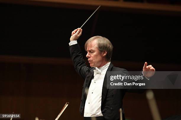 American conductor David Robertson conducts the Israel Philharmonic Orchestra during a performance at the International Congress Center Concert Hall,...