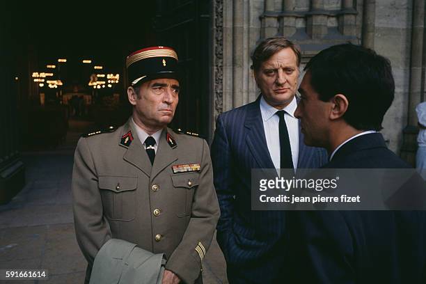 French actors Claude Brasseur, Bruno Cremer and Richard Berry on the set of L'Union sacrée written and directed by Alexandre Arcady.