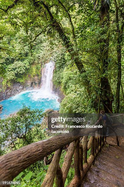 costa rica, catarata del rio celeste - rio azul stock pictures, royalty-free photos & images