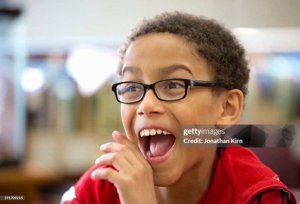 Ten-year-old boy works on class computer.