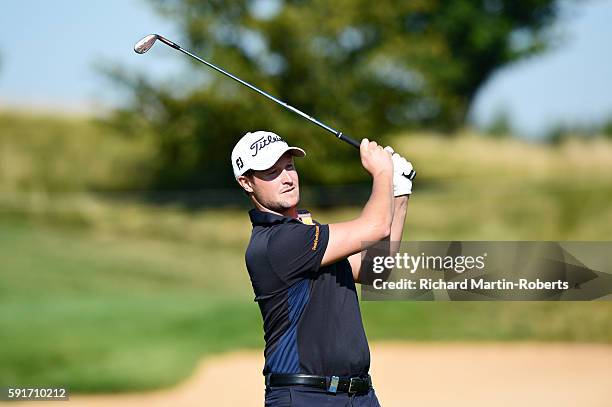 Bjorn Akesson of Sweden takes his third shot on the 9th hole during day one of the D+D REAL Czech Masters at Albatross Golf Resort on August 18, 2016...