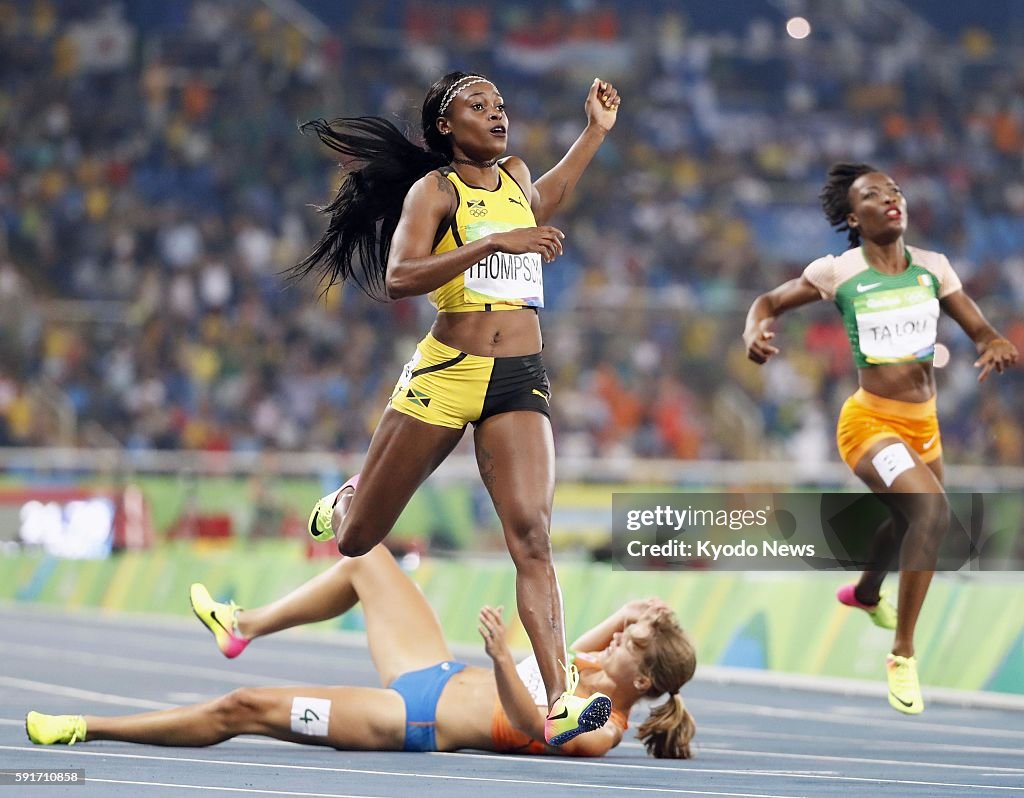 Olympics: Thompson wins women's 200-meter gold