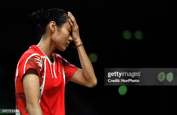 China's Wang Yihan reacts during the women's singles quarterfinal of Badminton against India's Pusarla V. Sindhu at the 2016 Rio Olympic Games in Rio...