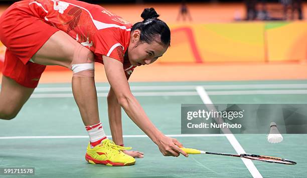 China's Wang Yihan competes during the women's singles quarterfinal of Badminton against India's Pusarla V. Sindhu at the 2016 Rio Olympic Games in...