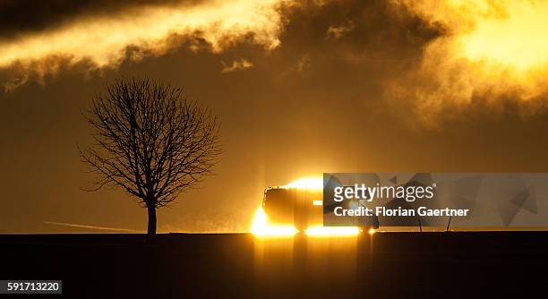 Camper is captured in front of the sunset on Februar 07, 2015 in Stadtallendorf, Germany.