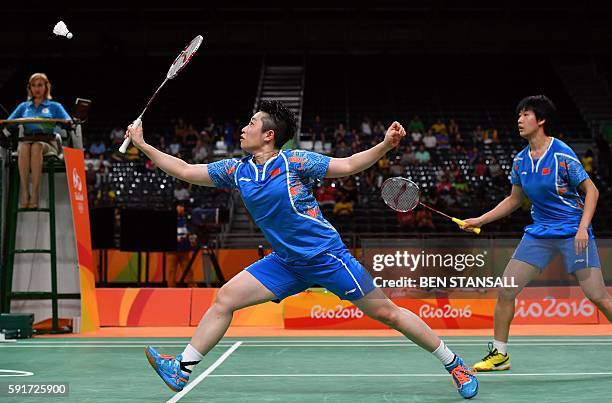 China's Tang Yuanting and China's Yu Yang returns against South Korea's Jung Kyung Eun and South Korea's Shin Seung Chan during their women's doubles...